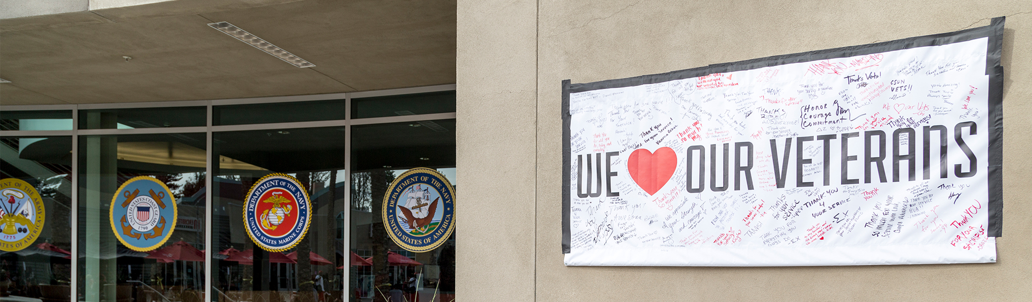 Banner on the USU Sol Center during We (Heart) Our Veterans Week Celebration