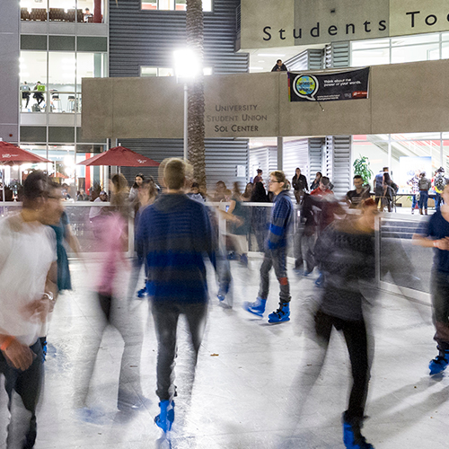 Students ice skate during Crunch Time, Fall 2015, when the USU Plaza del Sol was converted into an ice skating rink
