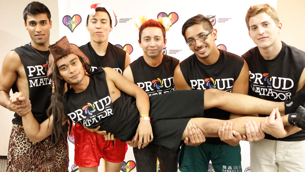 Six students pose in their Proud to be a Matador shirts at the National Coming Out Day event