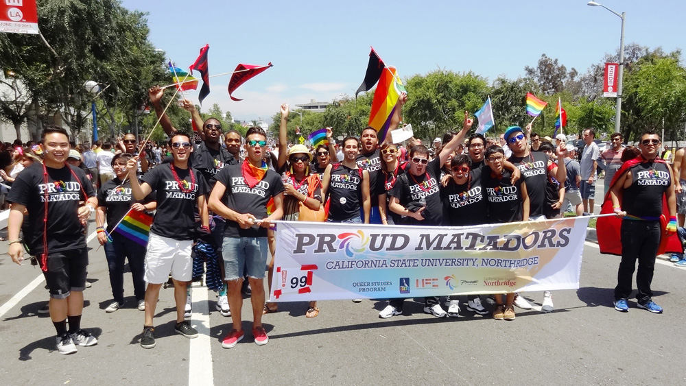 CSUN students enthusiastically march with a banner marked “Proud Matadors” at the West Hollywood Pride Parade