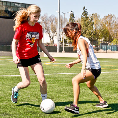 Students play soccer on the Student Recreation Center field