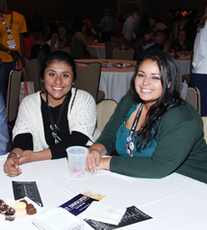 BOD student directors Perlita Varela and Kandee Bracero sit at a session at the ACUI Annual Conference in Orlando, FL